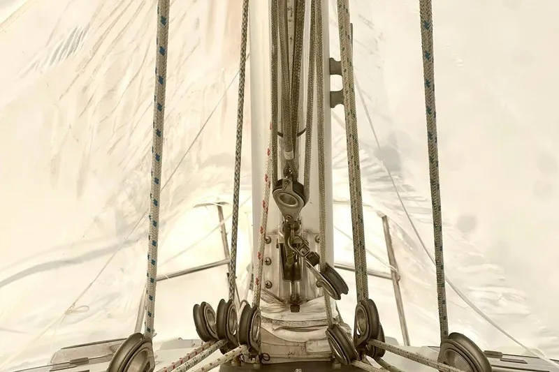 Slide: The Image of Close-up of Catalina 36 MkII sailboat rigging, showcasing ropes and pulleys, 1998 model. - 6