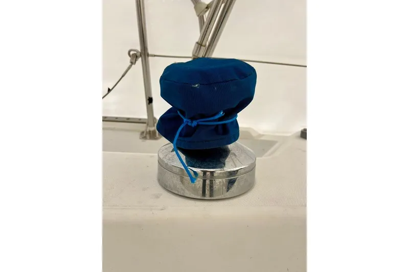 Slide: The Image of Blue winch cover on a 1998 Catalina 36 MkII sailboat deck. - 8