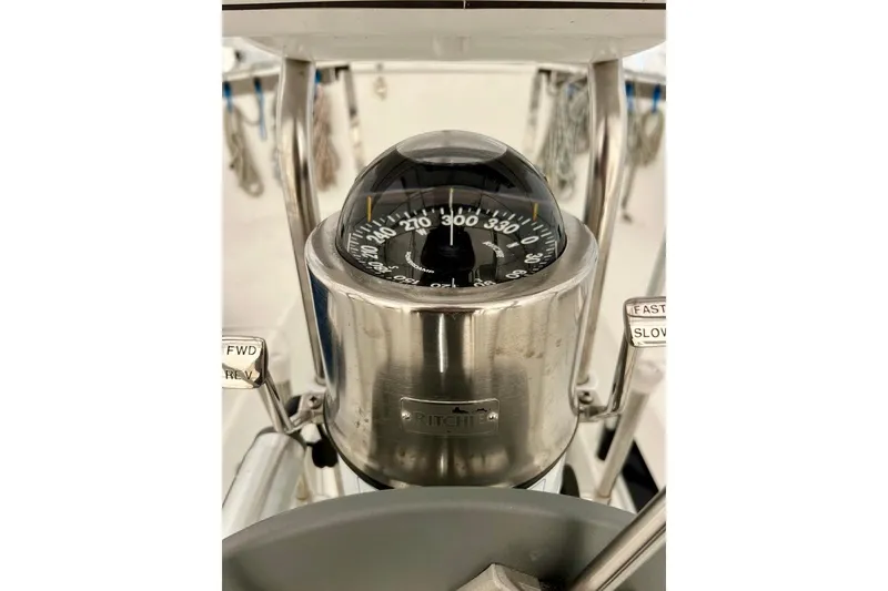 Slide: The Image of Compass on a 1998 Catalina 36 MkII sailboat, featuring navigation controls. - 9
