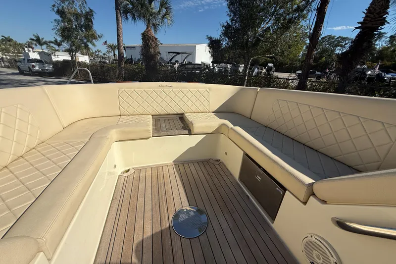 Slide: The Image of Luxurious seating area on a 2018 Chris-Craft Launch 30 boat with elegant upholstery. - 10