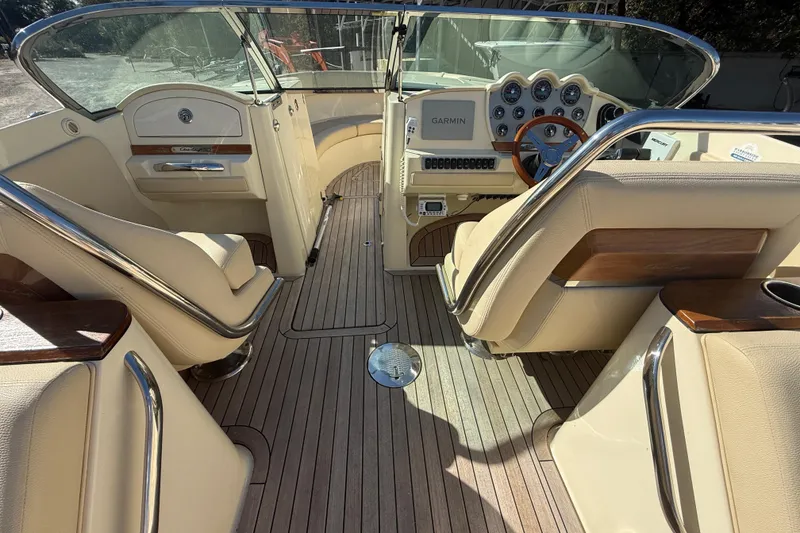 Slide: The Image of Luxurious 2018 Chris-Craft Launch 30 boat interior with elegant seating and modern dashboard. - 11