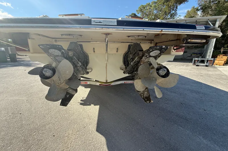 Slide: The Image of 2018 Chris-Craft Launch 30 boat stern with dual propellers on a sunny day. - 19