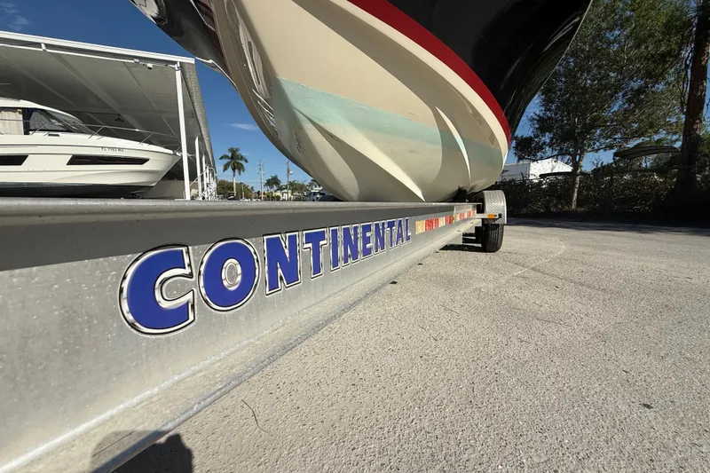 Slide: The Image of 2018 Chris-Craft Launch 30 on Continental trailer, parked outdoors. - 20