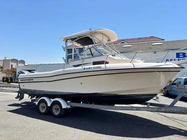 Slide: The Image of 2007 Grady-White Gulfstream 232 boat on trailer outdoors. - 36