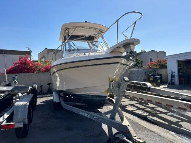 Slide: The Image of 2007 Grady-White Gulfstream 232 boat on trailer outdoors. - 39