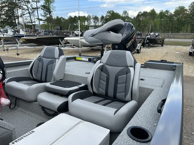 Slide: The Image of 2026 G3 Sportsman 1810 boat with gray seats outdoors. - 9