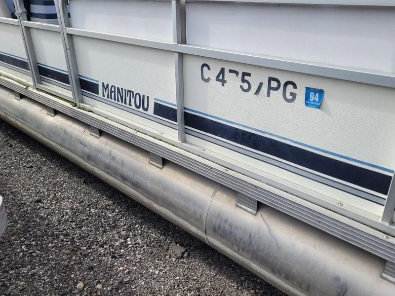 Slide: The Image of Manitou w/ 50HP Honda 1990 - 10