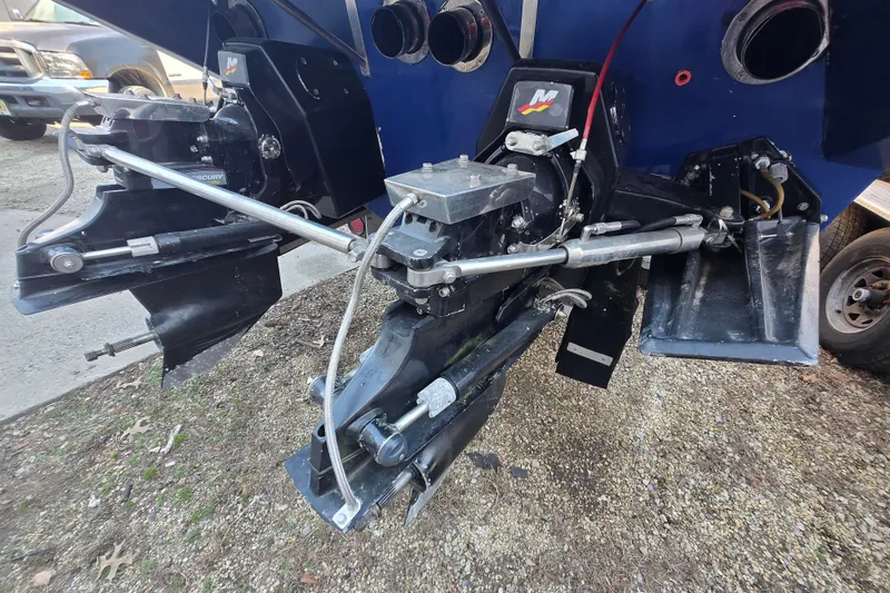 Slide: The Image of Rear view of a 2002 Avanti 41 boat's outboard motor and propeller system. - 20