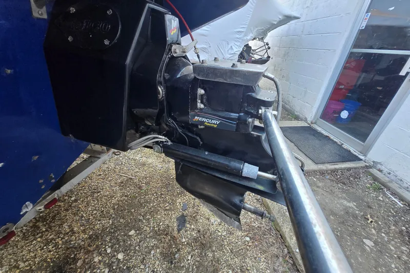 Slide: The Image of Close-up of a 2002 Avanti 41 boat engine with Mercury Racing components. - 22