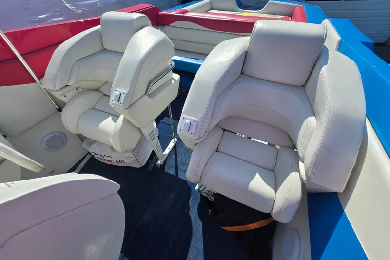 Slide: The Image of Luxurious seating on a 2002 Avanti 41 boat with white leather upholstery. - 30