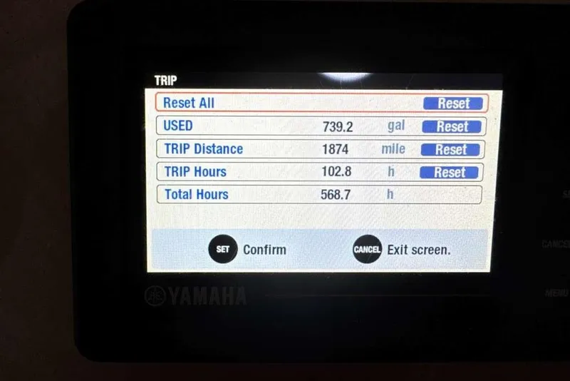 Slide: The Image of Yamaha trip display showing fuel usage, distance, and hours for 2016 ShearWater 27 Carolina. - 10
