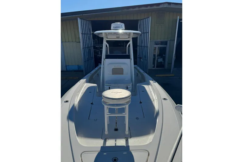 Slide: The Image of 2016 ShearWater 27 Carolina boat with Garmin equipment, docked in a marina. - 7