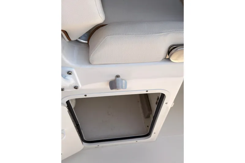 Slide: The Image of Storage compartment on a 2020 Sea Hunt Ultra 255 SE boat. - 28