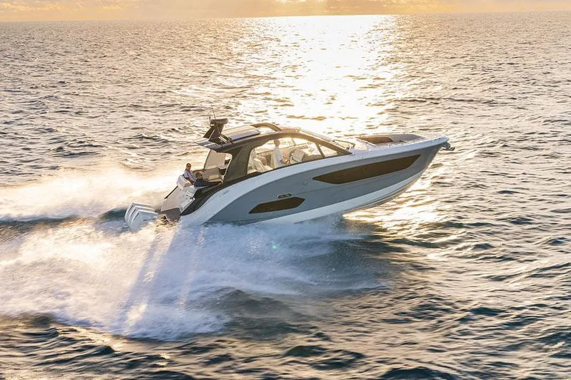 The Image of Manufacturer Provided Image: 2022 Sea Ray Sundancer 370 OB cruising on open water at sunset. - 0
