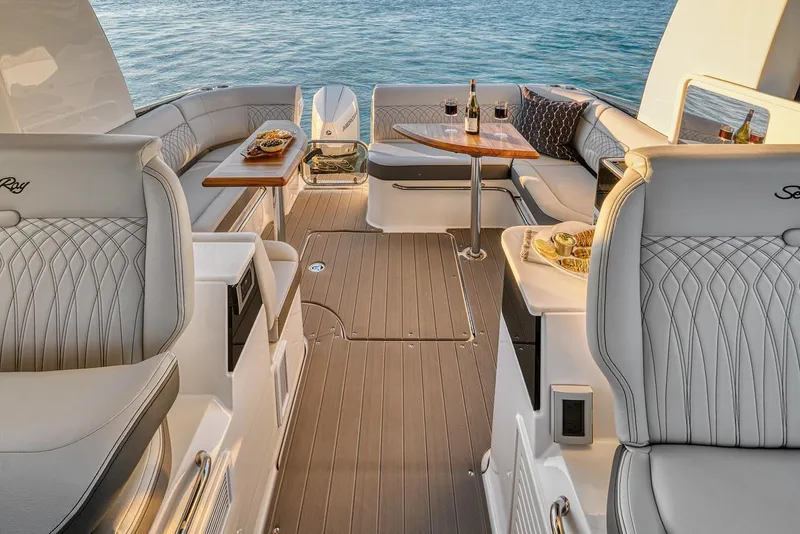 Slide: The Image of Manufacturer Provided Image: Luxurious 2022 Sea Ray Sundancer 370 OB boat interior with elegant seating and dining area. - 11