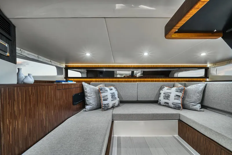 Slide: The Image of Manufacturer Provided Image: 2022 Sea Ray Sundancer 370 OB interior with modern seating and ambient lighting. - 17