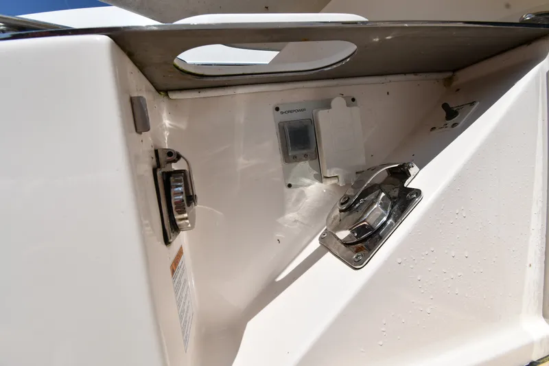 Slide: The Image of Control panel on a 2016 Tiara Yachts 50 Coupe, featuring switches and connectors. - 17