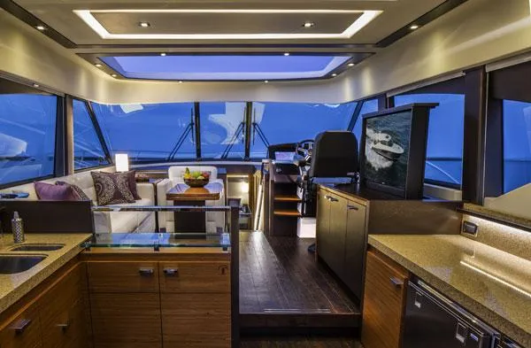 Slide: The Image of Manufacturer Provided Image: Luxurious interior of a 2016 Tiara Yachts 50 Coupe with modern amenities. - 11