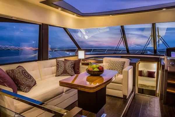 Slide: The Image of Manufacturer Provided Image: Luxurious interior of 2016 Tiara Yachts 50 Coupe with sunset view. - 13