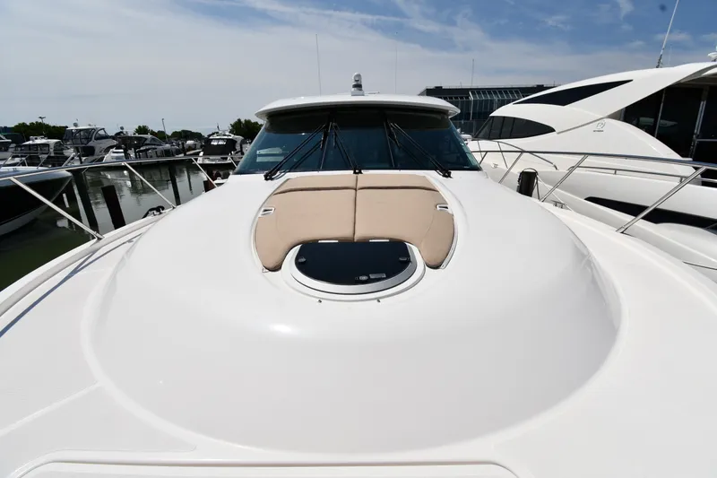 Slide: The Image of 2016 Tiara Yachts 50 Coupe with sleek deck design and luxurious seating. - 7
