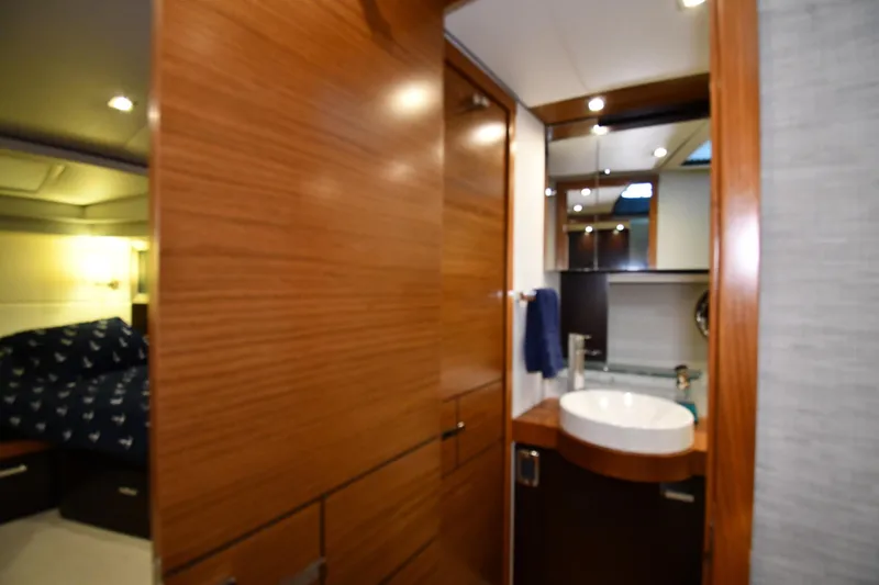 Slide: The Image of Luxurious bathroom interior of 2016 Tiara Yachts 50 Coupe with modern fixtures. - 22