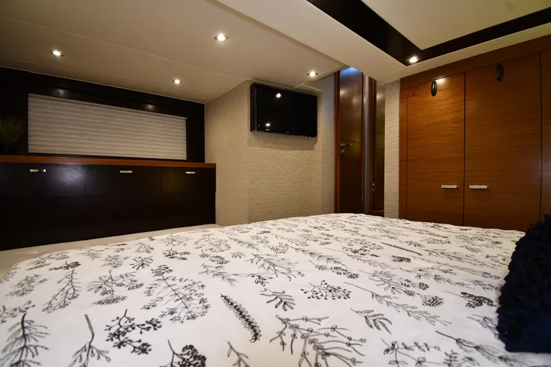 Slide: The Image of Luxurious interior of 2016 Tiara Yachts 50 Coupe with elegant wood finishes and modern decor. - 28