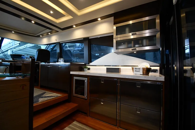 Slide: The Image of Luxurious interior of 2016 Tiara Yachts 50 Coupe with modern kitchen design. - 32
