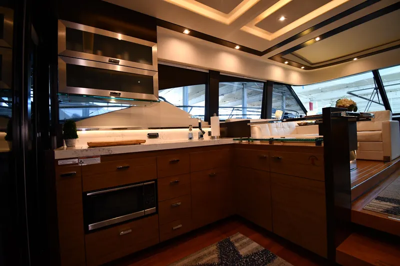 Slide: The Image of Luxurious interior of 2016 Tiara Yachts 50 Coupe featuring modern kitchen design. - 33