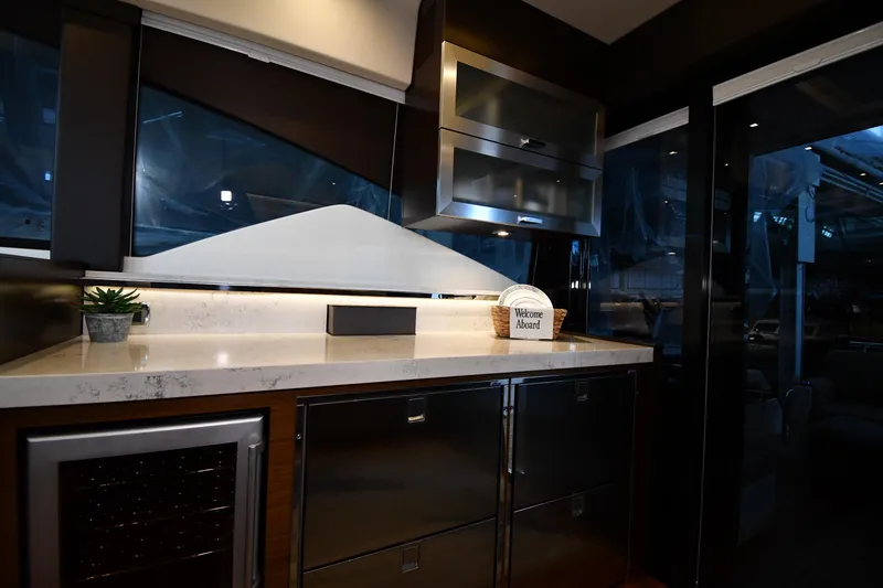 Slide: The Image of Luxurious interior of 2016 Tiara Yachts 50 Coupe with modern kitchen amenities. - 35