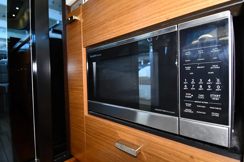 Slide: The Image of Built-in Sharp convection microwave in 2016 Tiara Yachts 50 Coupe kitchen. - 40