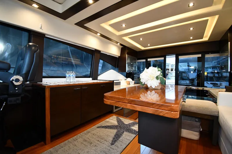 Slide: The Image of Luxurious interior of 2016 Tiara Yachts 50 Coupe with elegant wood finishes and modern lighting. - 43