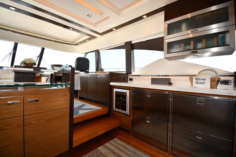 Slide: The Image of Luxurious interior of 2016 Tiara Yachts 50 Coupe, featuring modern kitchen and elegant design. - 42