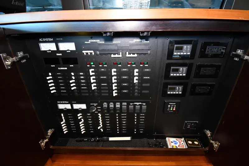 Slide: The Image of Electrical control panel on a 2016 Tiara Yachts 50 Coupe. - 51