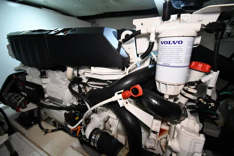 Slide: The Image of Engine compartment of a 2016 Tiara Yachts 50 Coupe with Volvo components. - 59