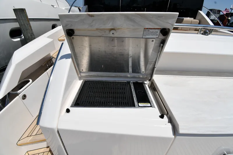 Slide: The Image of Outdoor grill on 2016 Tiara Yachts 50 Coupe, showcasing sleek design and functionality. - 20