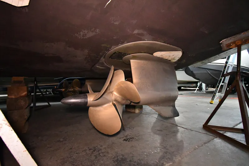 Slide: The Image of Underwater view of 2016 Tiara Yachts 50 Coupe propeller and rudder in a boatyard. - 71