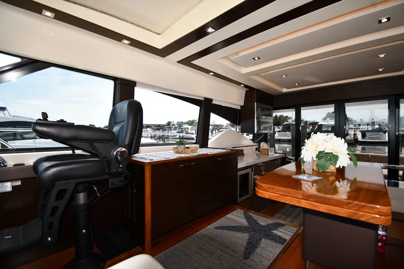 Slide: The Image of Luxurious interior of 2016 Tiara Yachts 50 Coupe with elegant seating and modern design. - 54