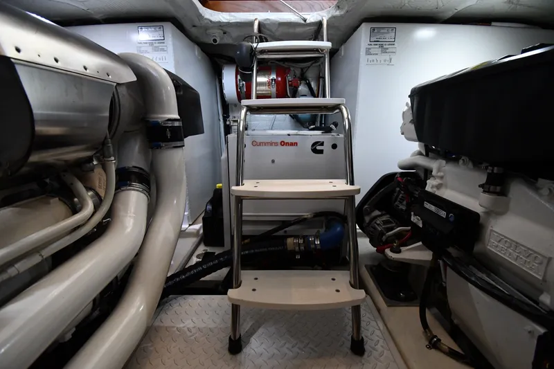 Slide: The Image of Engine room of 2016 Tiara Yachts 50 Coupe with Cummins Onan generator. - 64