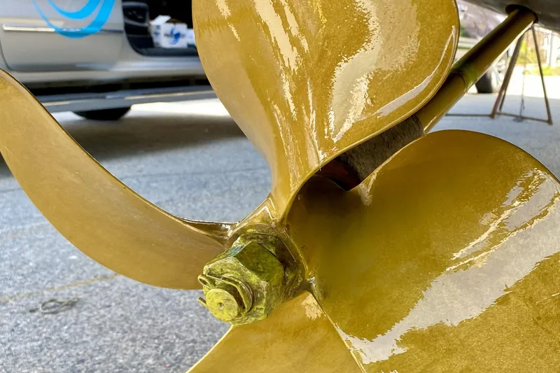 Slide: The Image of Close-up of a polished propeller on a 2006 Sea Ray 340 Sundancer boat. - 14