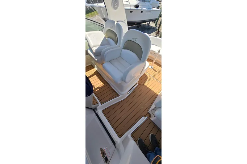 Slide: The Image of Luxury seating on 2006 Sea Ray 340 Sundancer yacht with teak flooring. - 29