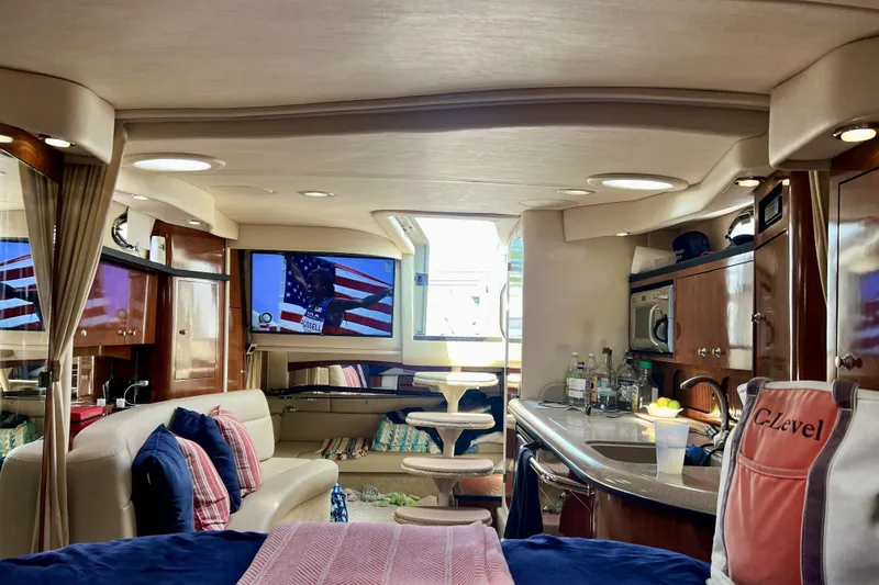 Slide: The Image of Luxurious interior of a 2006 Sea Ray 340 Sundancer yacht with modern amenities. - 31