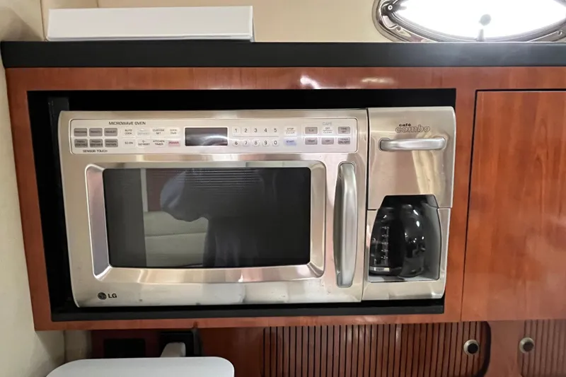 Slide: The Image of Built-in LG microwave and coffee maker on 2006 Sea Ray 340 Sundancer yacht. - 35