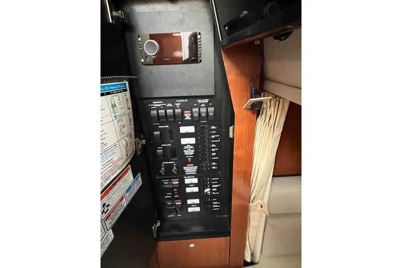 Slide: The Image of Electrical panel of 2006 Sea Ray 340 Sundancer boat interior. - 39