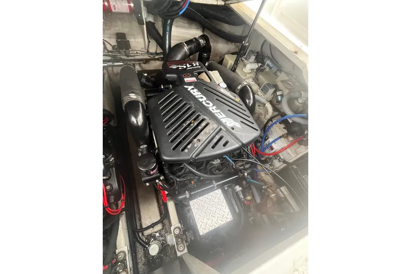Slide: The Image of Engine compartment of a 2006 Sea Ray 340 Sundancer with Mercury engine. - 46