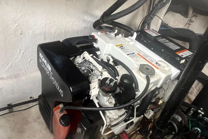 Slide: The Image of Kohler power system in 2006 Sea Ray 340 Sundancer engine room. - 47