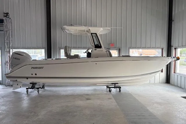 The Image of 2026 Pursuit S 248 Sport boat in a showroom, side view, white exterior. - 0