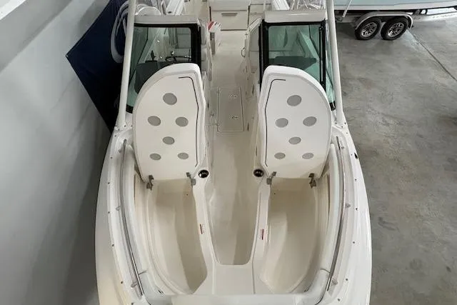 Slide: The Image of 2026 Pursuit DC 266 Dual Console boat interior, featuring spacious seating and modern design. - 16