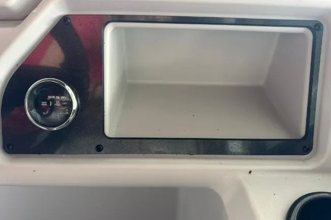 Slide: The Image of 2026 Sweetwater 2286FX dashboard with gauge and storage compartment. - 16