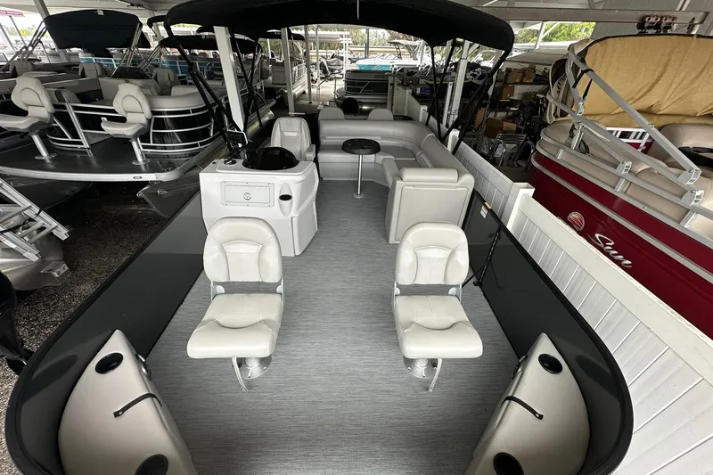 Slide: The Image of 2026 Sweetwater 2286FX pontoon boat with spacious seating and modern design. - 4