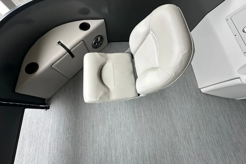 Slide: The Image of Interior of 2026 Sweetwater 2286FX boat with white seating and modern design. - 7